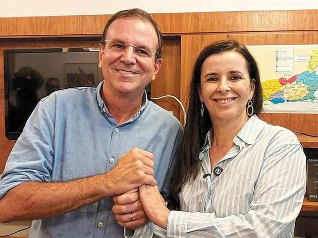 O prefeito do Rio de Janeiro, Eduardo Paes, e a advogada ligada à Assembleia de Deus Jane Reis — Foto: Caio Sartori