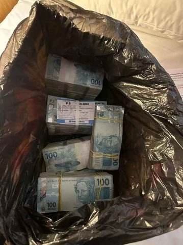 Dinheiro apreendido em endereço ligado a Sóstenes — Foto: Reprodução/PF