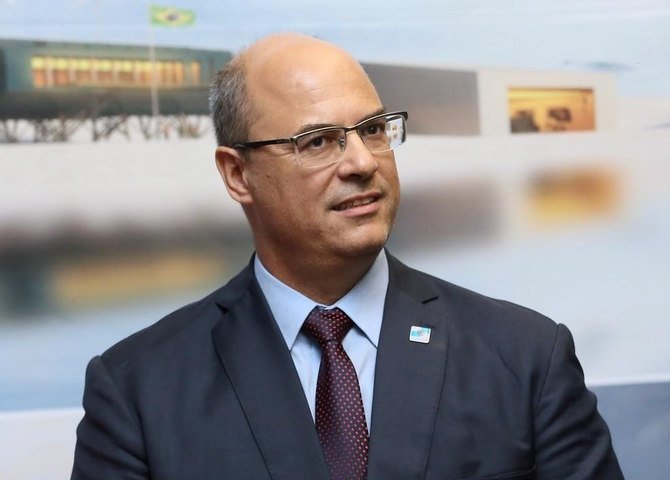 Presidente do DC diz ter barrado Witzel por já haver 'doidos demais' na sigla; ex-governador nega ter feito investida